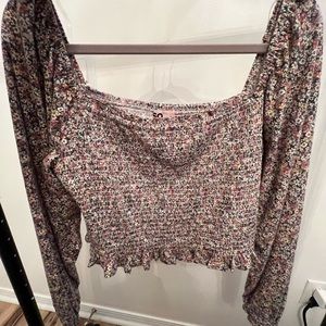 Puffy sleeved, elastic middle, blouse.